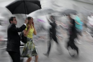 Couple under umbrella in rain